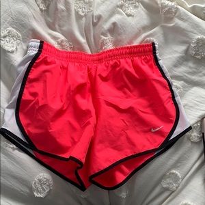 Hot pink Nike Dri-Fit shorts